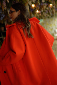 Powerful Woman Orange Coat